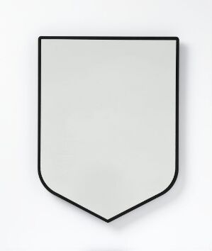  A matte gray, shield-shaped object with a soft finish mounted on a white wall, titled "Håp" by an unknown artist.