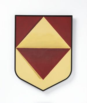  A graphic image of a shield in deep burgundy with a centered muted gold diamond shape. The artwork is titled "Frihet".