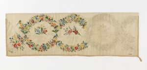  An antique horizontal textile piece with a cream-colored background featuring two vibrant floral garland circles connected by a swag on the left side, with the remainder of the textile plain and a visible fringe on the right end.