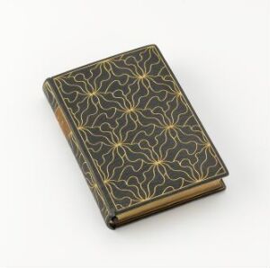  An exquisitely bound book titled "Digte av Baggesen" in Maroquin leather with linear golden ornaments forming diamond and floral patterns, designed by Hans Tegner, showcasing marbled endsheets and bright gilded edges against a plain background.