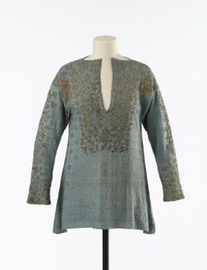  "Historical silk nightshirt called 'Nattrøye,' hand-knitted with patterned stitching, hand-embroidered with metallic thread and sequins, with a fluffy inside for comfort. Artist unidentified."