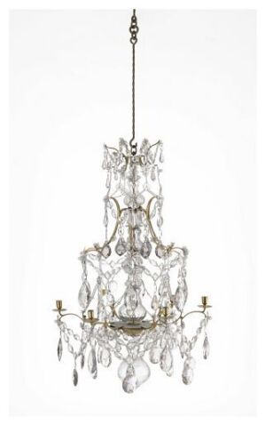  An elegant, multi-tiered chandelier with metallic, vine-like structures and numerous hanging clear crystals, designed to hold candle-style bulbs within a silver-finished frame.