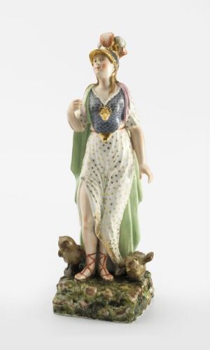  "Minerva med to ugler,” a porcelain statuette designed by Andreas Hall, depicting the Roman goddess Minerva in classical robes with a helmet, accompanied by two owls, set atop a rocky, moss-colored base designed to mimic natural terrain. The figurine is characterized by a muted color scheme of soft blues, greens, and creams, with touches of gold and the natural browns and tans of the owls