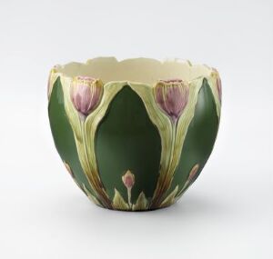  Decorative bowl with artichoke design, featuring deep green textured leaves and purple-pink bud accents around the rim, with a creamy yellow interior. Artistname and title are unknown.