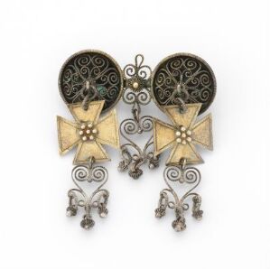  Pair of antique, symmetrical earrings featuring a dark circular filigree top connected to a golden star-shaped body with dangling tiny chain-linked metallic floral/bell-like elements against a light background.