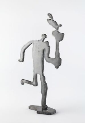  A monochromatic iron sculpture depicting a stylized human figure in a dynamic pose, exhibiting a textured surface from embossing, brushing, soldering, and oxidizing techniques. Created by an artist associated with Lillehammer OL, the piece embodies energy and movement against a light background.