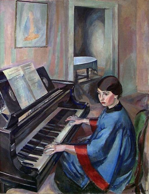 At the grand piano