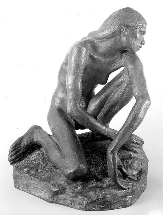 Kvinne som sitter på huk