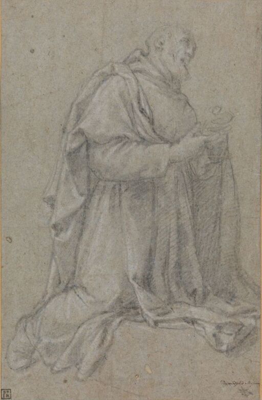 Drapert knelende figur