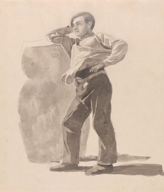 Gutt som støtter seg til en sten