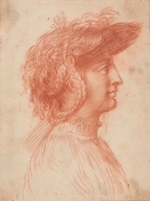 Young man wearing a hat, seen in profile