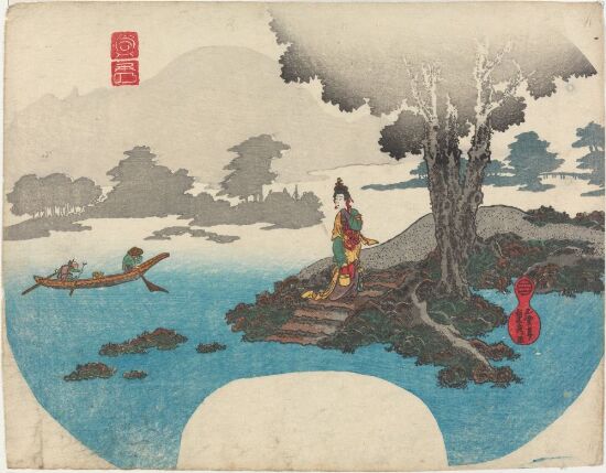 Vakker kinesisk kvinne i vannkanten