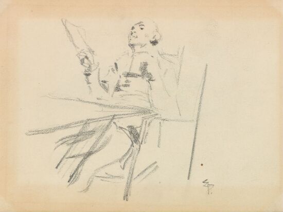 Sittende mann med bok