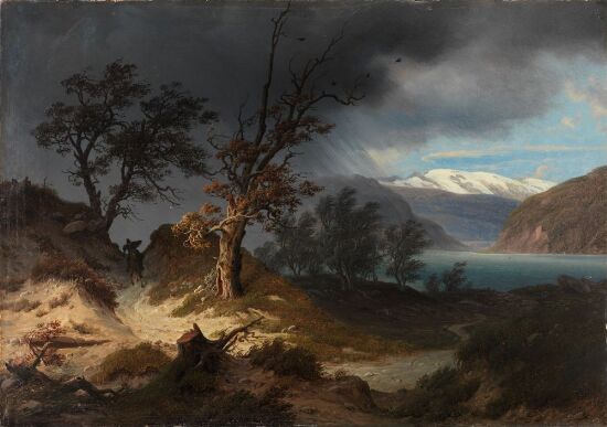 Uværslandskap med en rytter