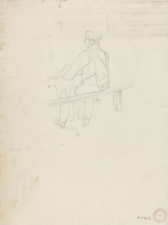 Sittende mann sett bakfra