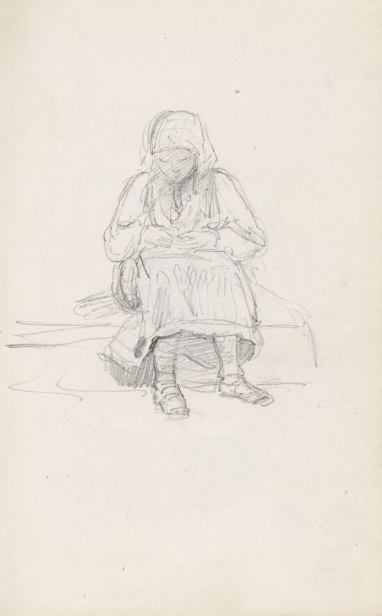 Sittende kvinnefigur