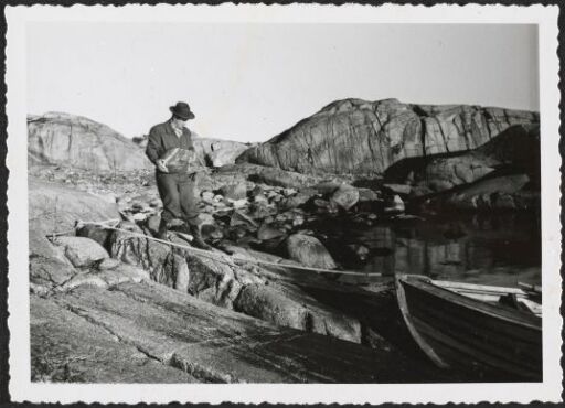 Odd Tandberg picking rocks for conglomerate stone-work