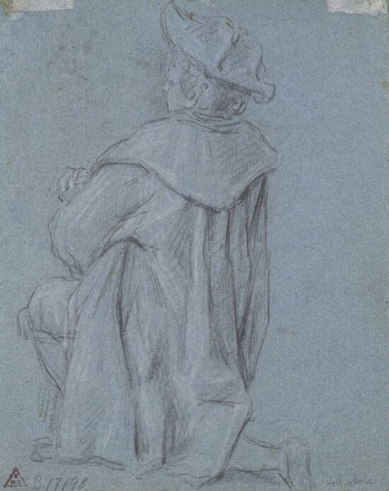 Knelende gutt sett bakfra