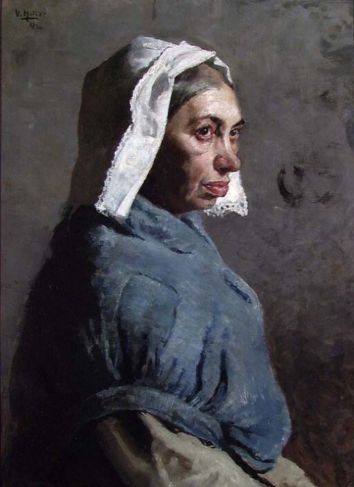 Eldre kvinne med hvitt hodeplagg