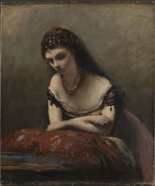 Young Woman Leaning on a Cushion