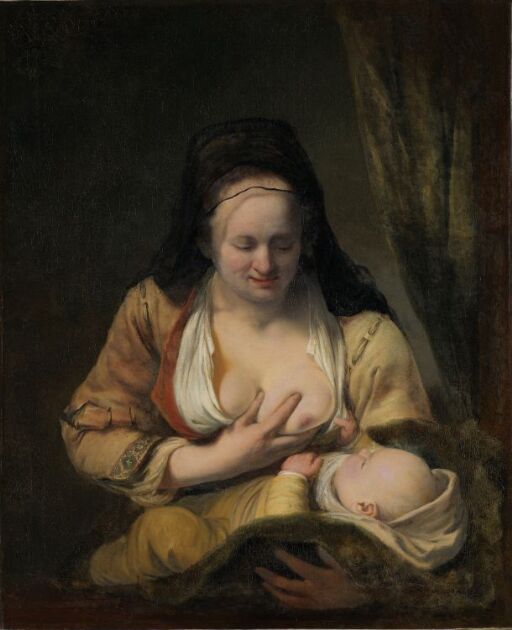 Kvinne med barn ved brystet