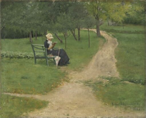 Lesende kvinne på hagebenk